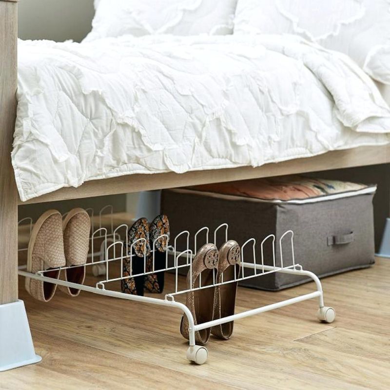 Пристосування для зберігання взуття під ліжком
