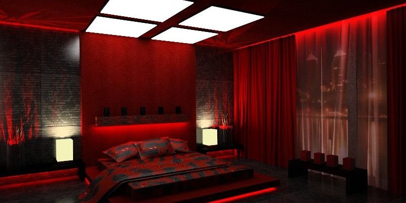 Оригінальне освітлення цієї червоної спальні створює майже містичну атмосферу