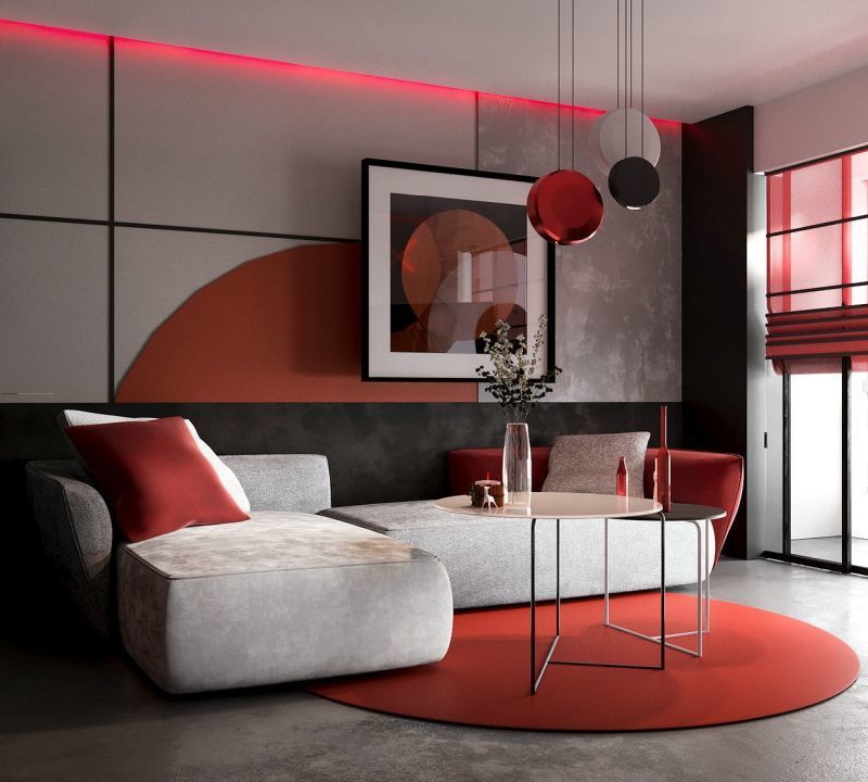 Червоно-сіро-біла палітра цієї вітальні створює елегантний і дещо стриманий інтер'єр